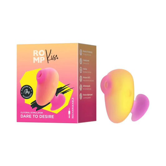 ROMP Kiss pink/coral clitoral stimulator with packaging, discreet and rechargeable design for travel-friendly pleasure.