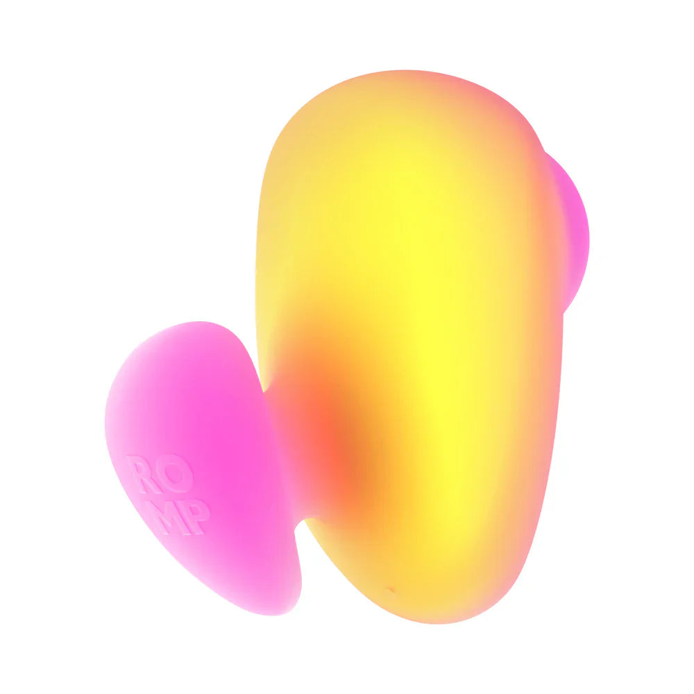 Pink and coral ROMP Kiss clitoral stimulator with ergonomic design for discreet travel-friendly pleasure.